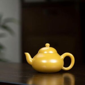 ẤM HOÀNG KIM CHU NÊ LÊ HÌNH